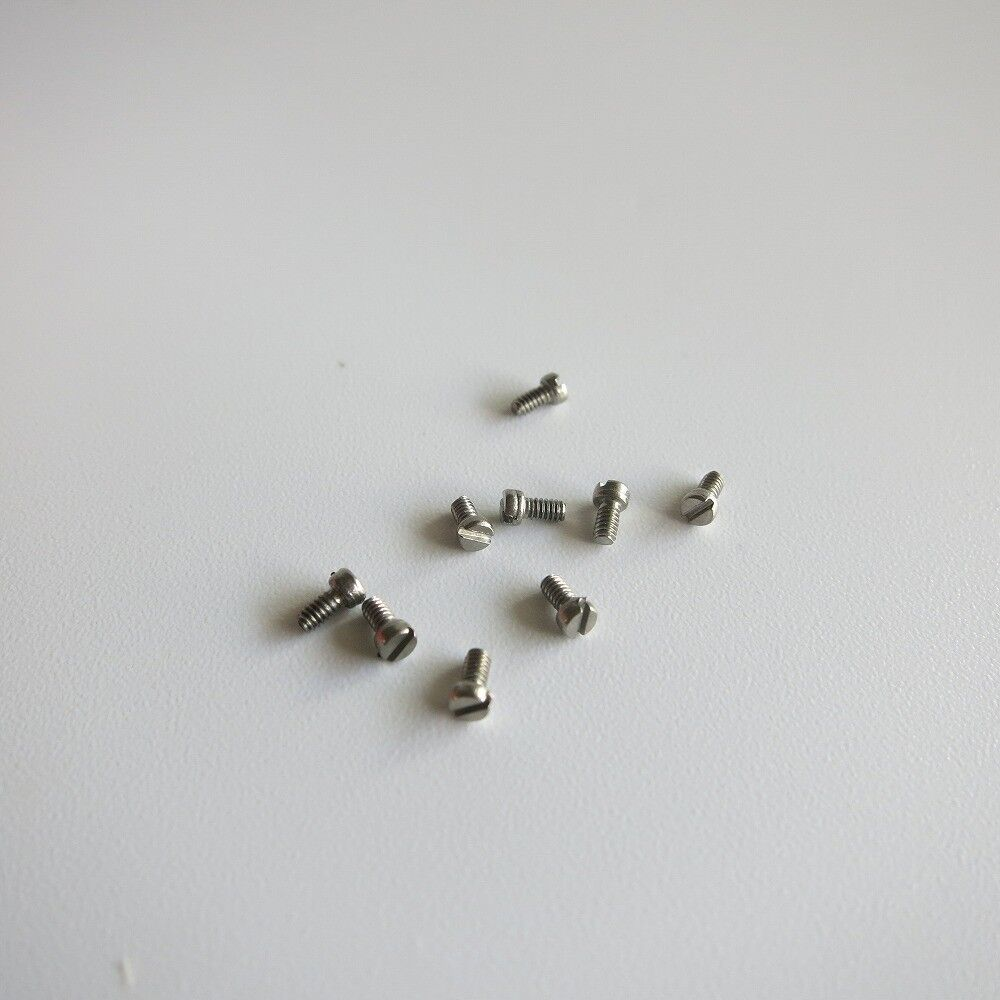 Red round box with 1000PCS steel screws for eyeglasses and watches, brand AB6004.