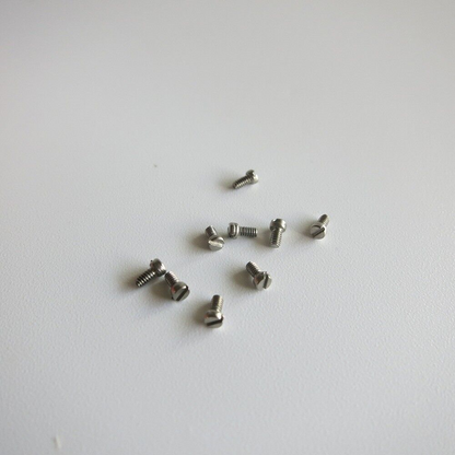 Red round box with 1000PCS steel screws for eyeglasses and watches, brand AB6004.