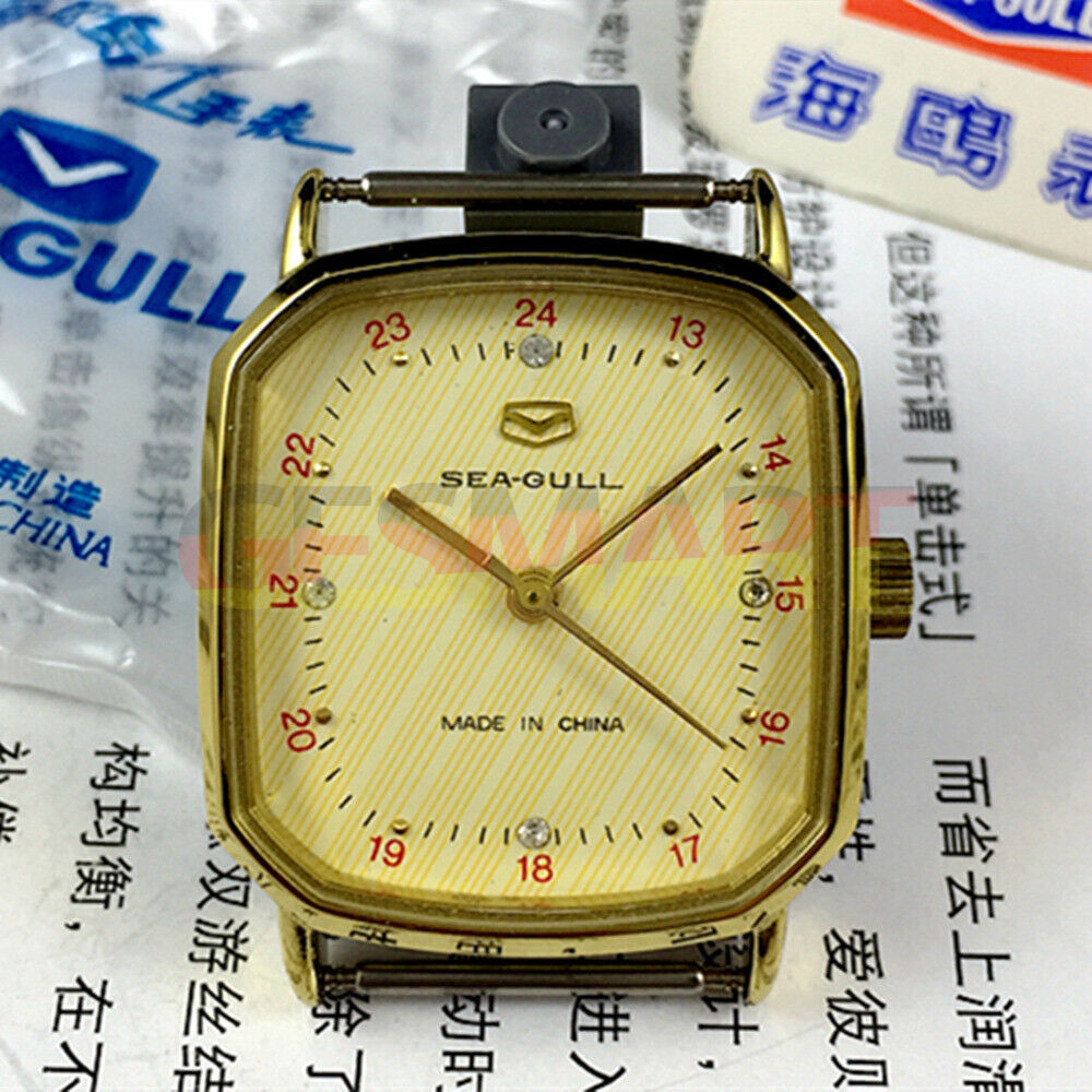Seagull 28mm ladies watch with golden square case, nail markers, and manual mechanical movement for elegant style.
