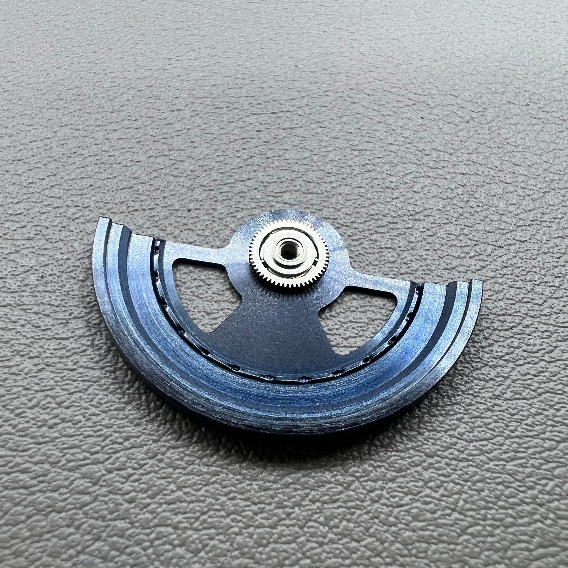 Blue hollow Geneva rotor oscillating weight for NH35 NH36 watch movements, precise and durable.