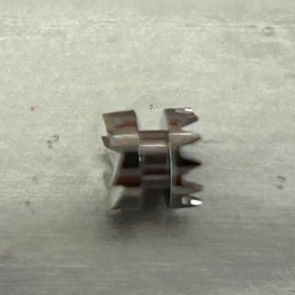 Sliding pinion clutch for Swiss ETA2000 watch movement, precise fit for smooth time adjustment.