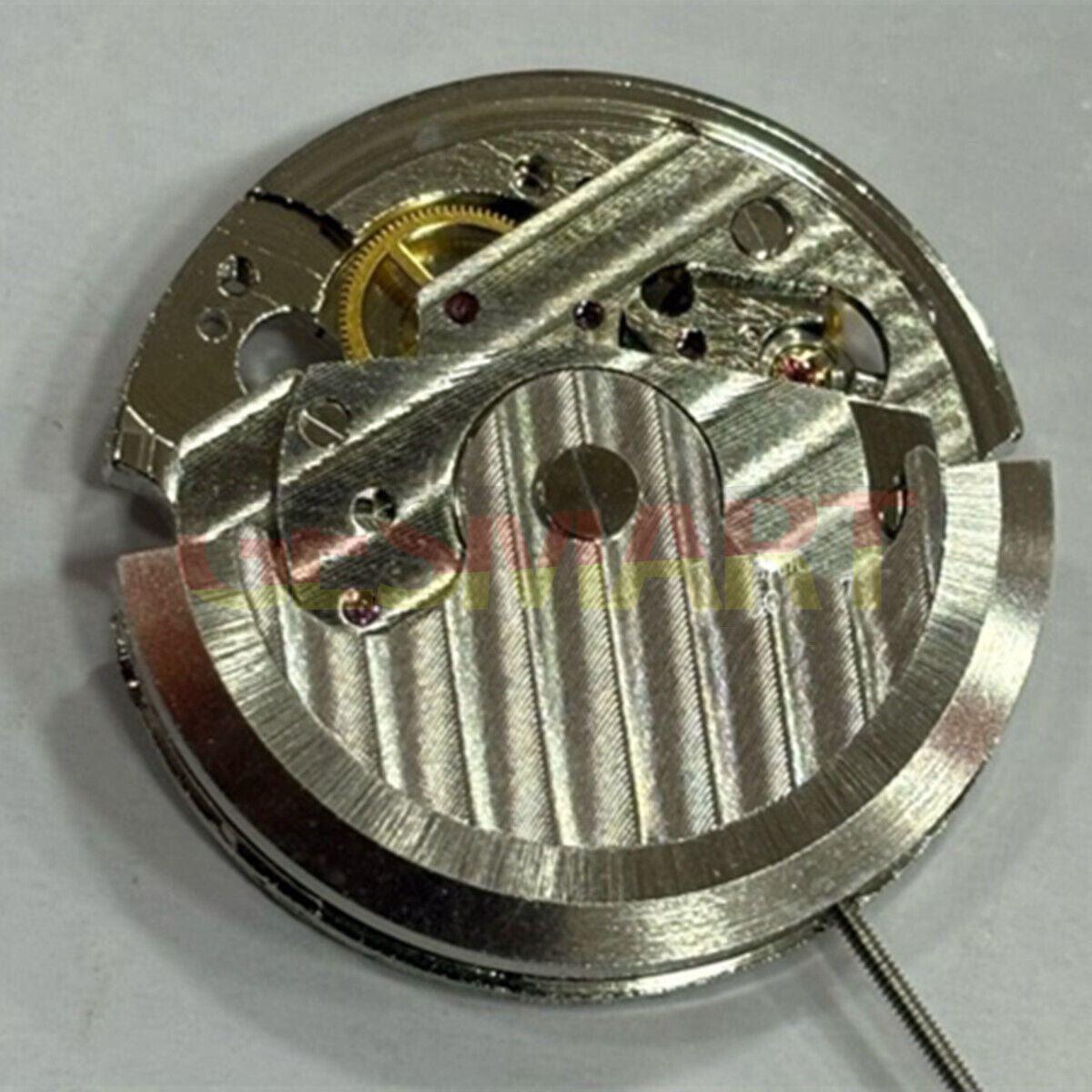 China made 2-hand automatic watch with mechanical movement and visible balance wheel at 6 o?clock, ideal for watch enthusiasts.