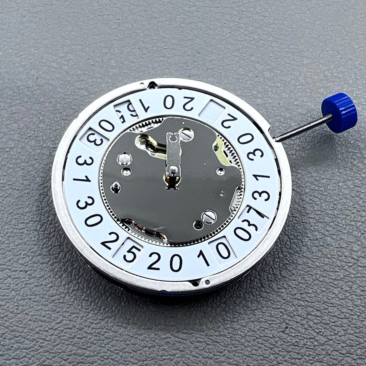 Swiss Ronda 4120B quartz watch movement by Ronda, precise and reliable timekeeping component.