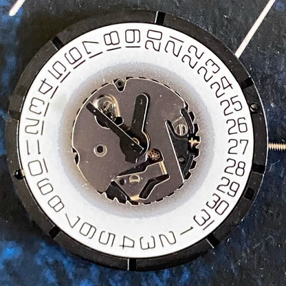 Swiss Made ISA 2331 quartz watch movement with 3 hands and date at 3, ideal for watch repairs.