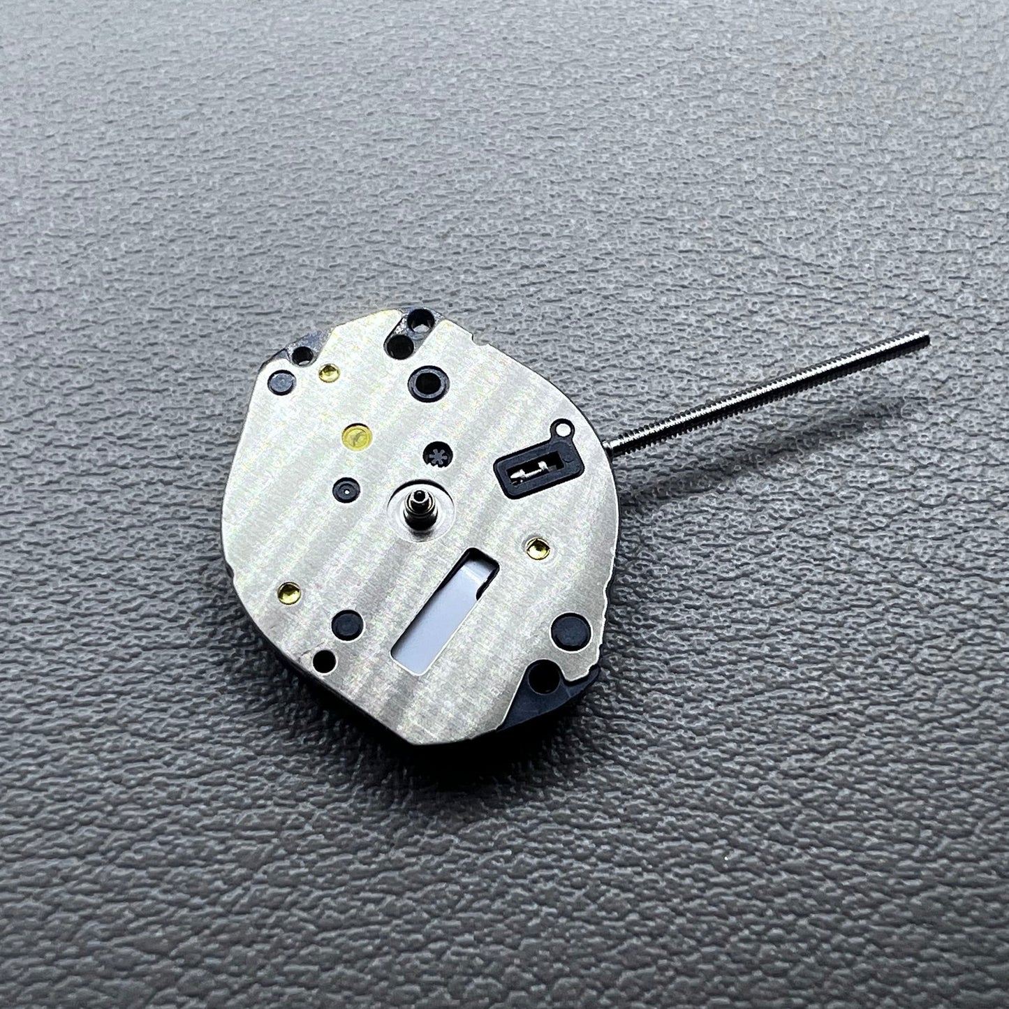 Japan Hattori Epson TMI AL35E quartz watch movement, precise timekeeping for repair and replacement.