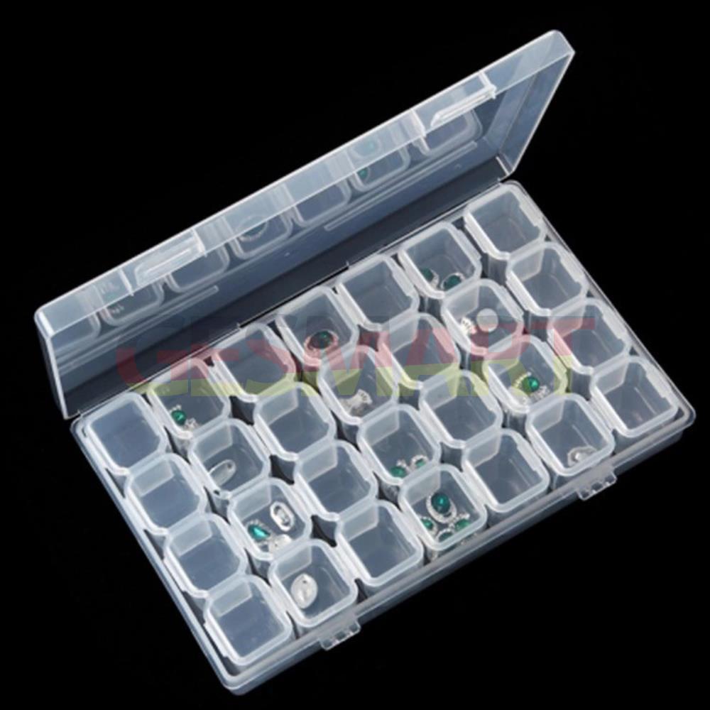 Clear 28-grid mini parts toolbox (11x17cm) with hinged lid for organized storage - durable and portable.