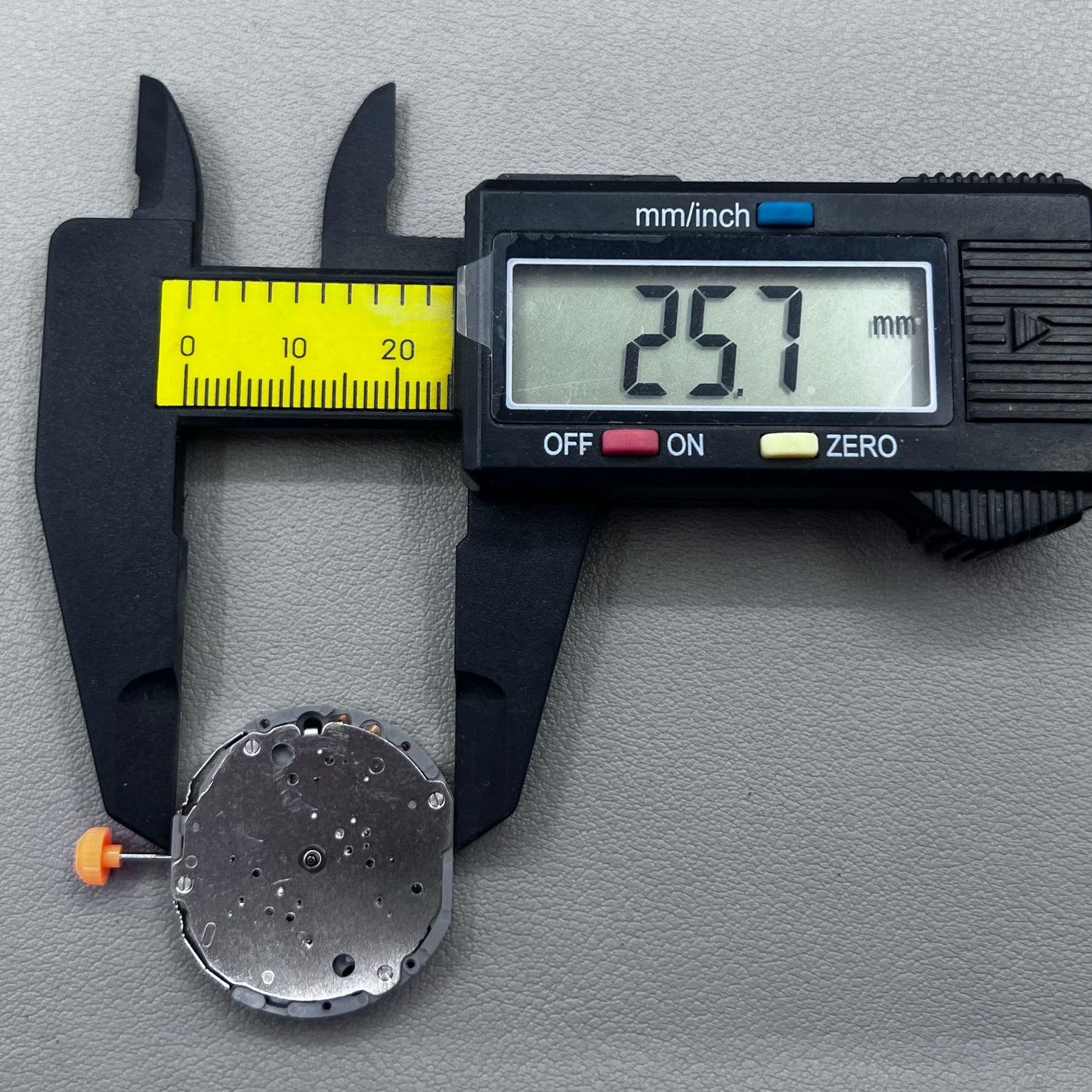 Japan Miyota JS10 quartz movement watch with small second hands at 6, 9, and 12 o'clock positions.