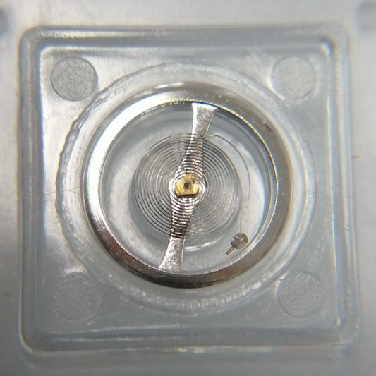 Set of 3 silver balance wheels for 7009 movement, precision components made in China for watch repair.