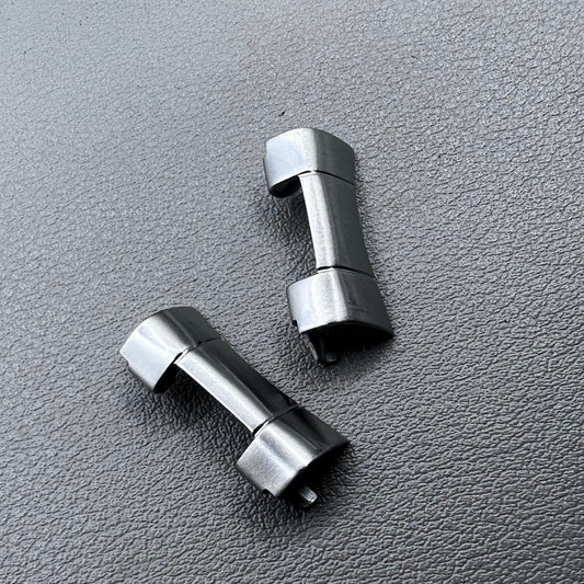 Set of 2 polished silver steel curved end links, 20x10mm, for secure watch band attachment.