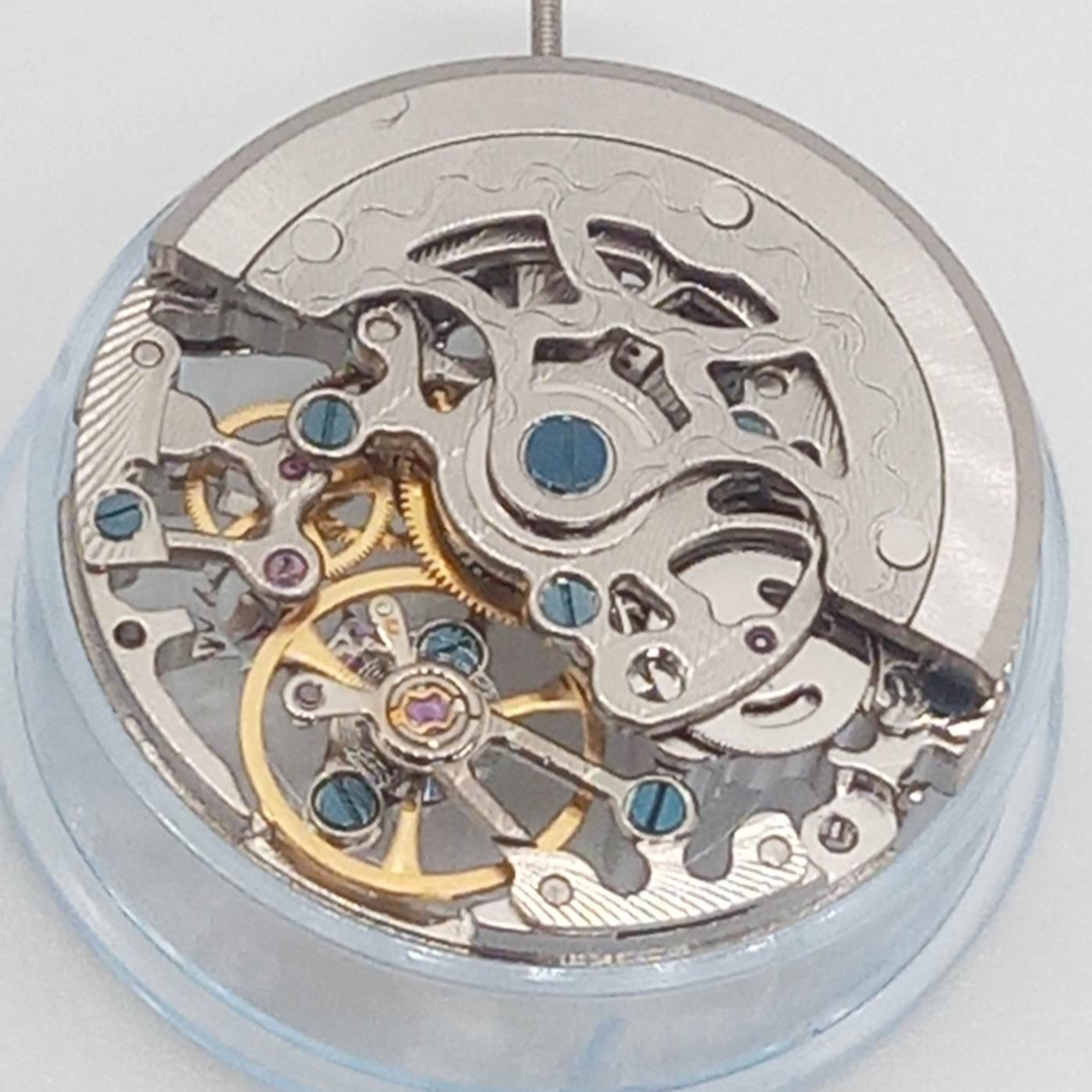 Chinese Hollow Tianjin T17 ST17 hand-winding watch movement with 2 hands, no calendar, precision craftsmanship.