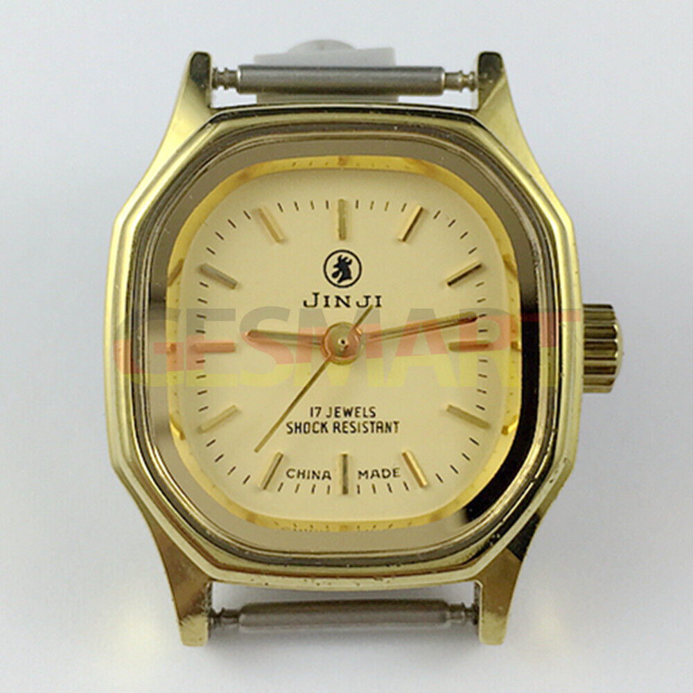Elegant 26mm SHANGHAI JINJI lady watch with golden square case and 17 jewel manual mechanical movement.