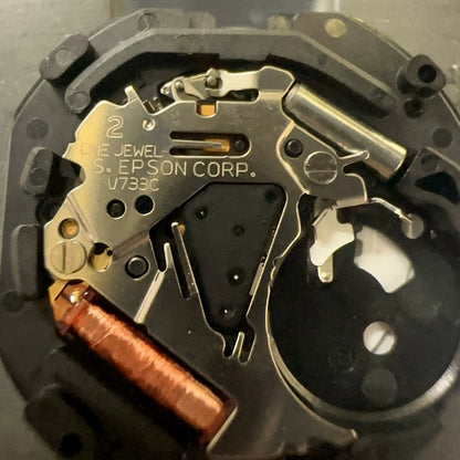 Epson V733C quartz day-date watch part, genuine Japan-made replacement for precise timekeeping.
