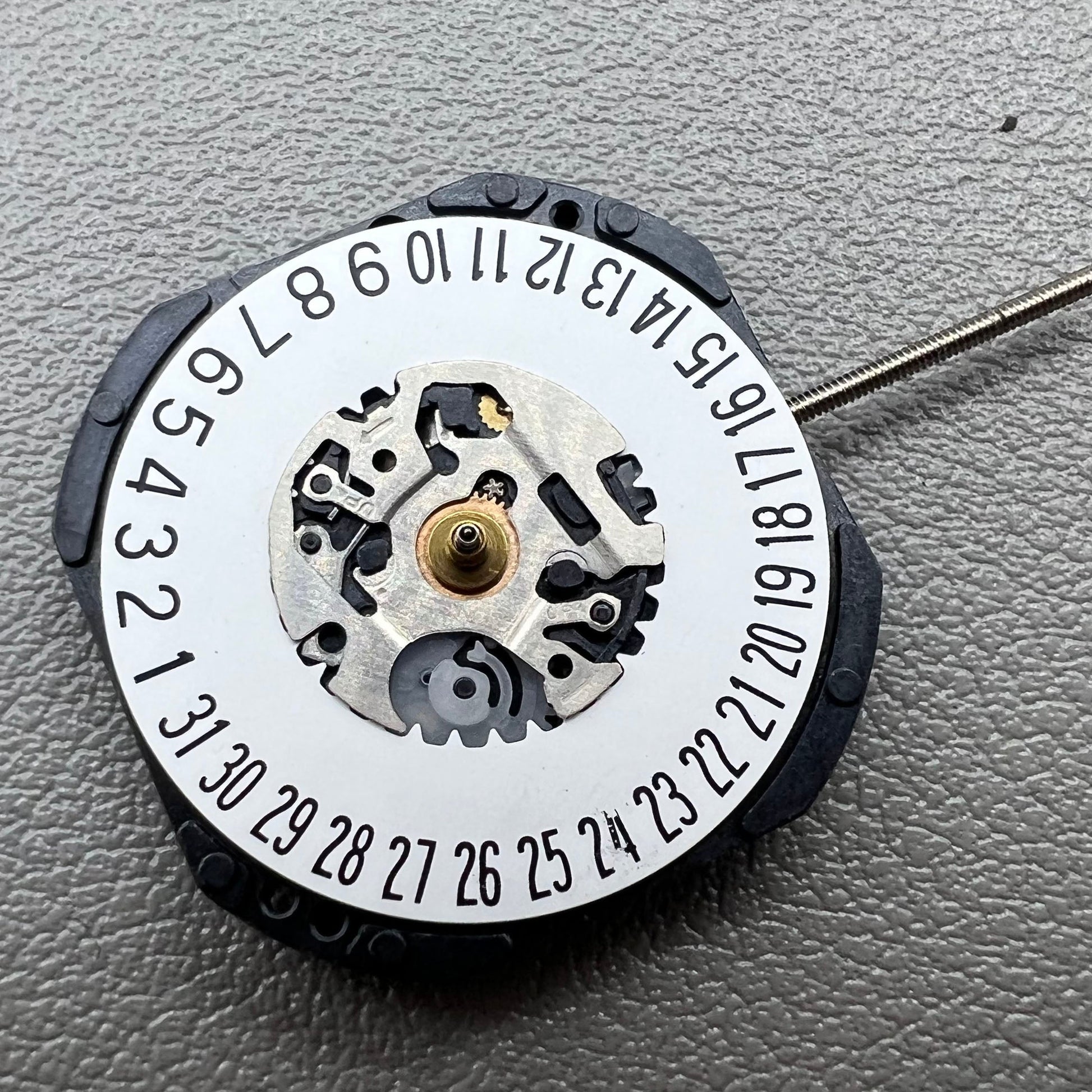 Orient HT711 watch with Japanese quartz movement, date display, and three hands at 6 o'clock position.