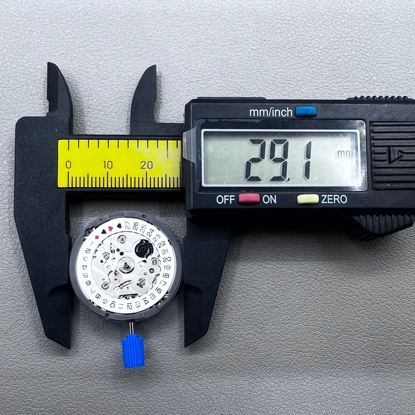 Seiko NH35A automatic mechanical movement with black spade hand, crown at 3 o'clock for SKX007.
