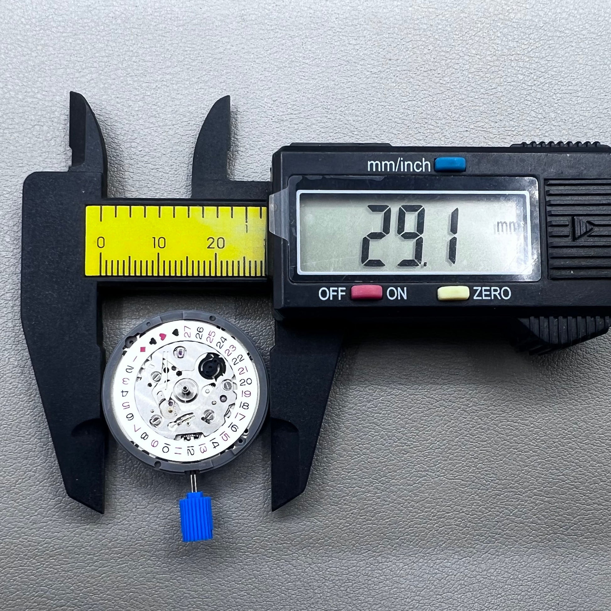 Seiko NH35A automatic mechanical movement with black spade hand, crown at 3 o'clock for SKX007.