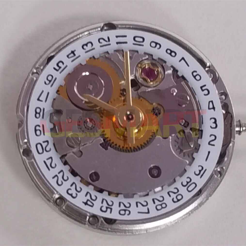 Silver mechanical watch movement with date at 3, China-made ETA2671 replacement for watch repair.