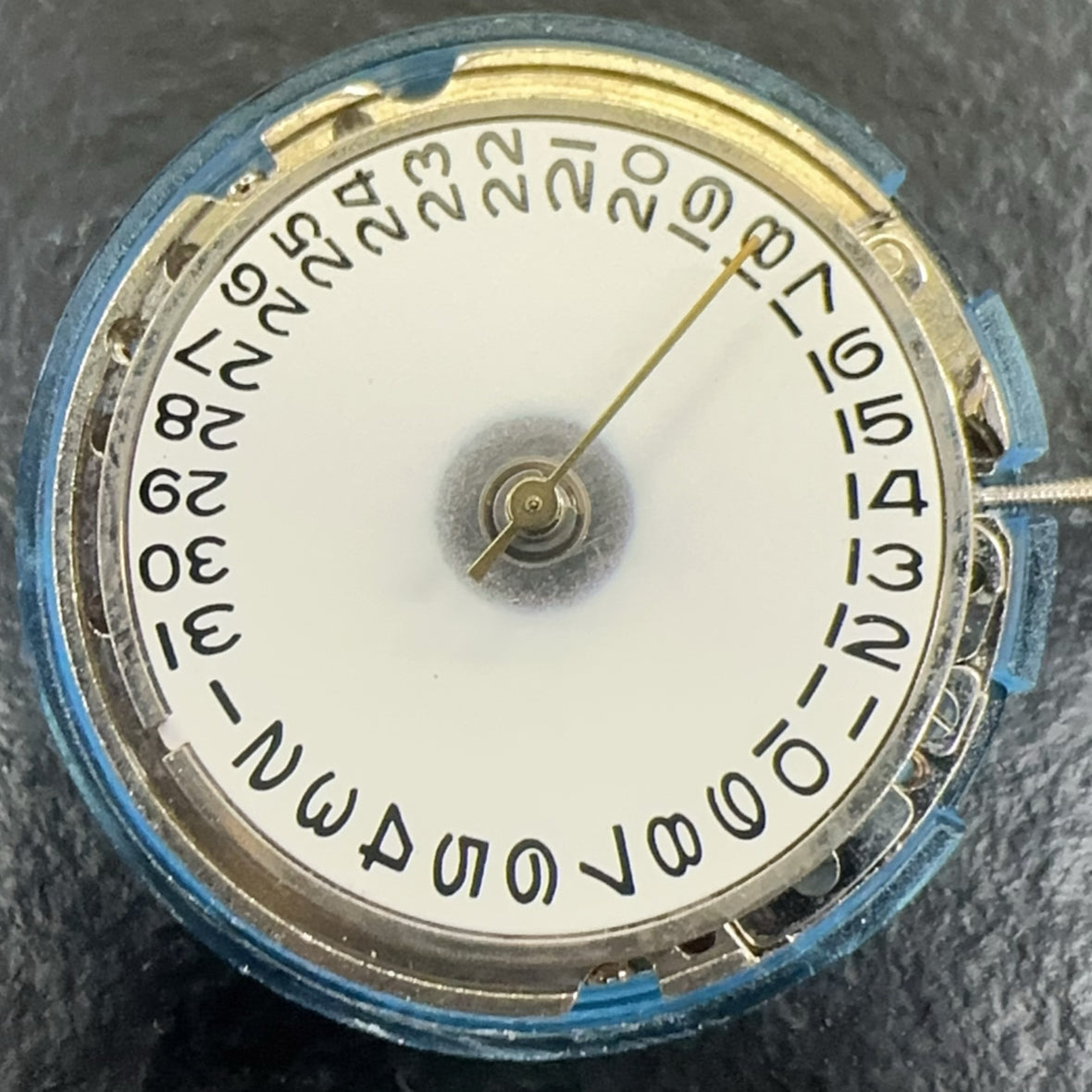 Tianjin 2813 mechanical watch movement with single calendar and three hands for precision timekeeping.