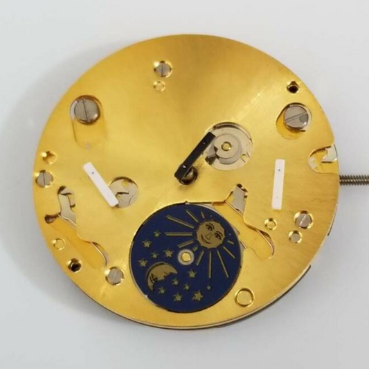 Gold quartz watch repair parts from ISA 9231, compatible with various watch models.