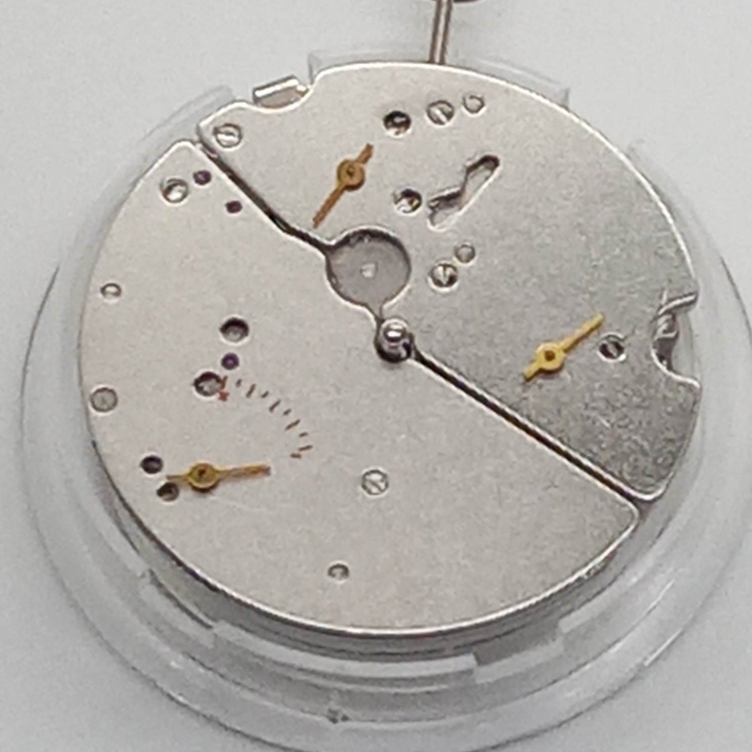 Chinese Tianjin T17 ST17 hand-winding mechanical watch movement with 2 hands and 10 o'clock power display.