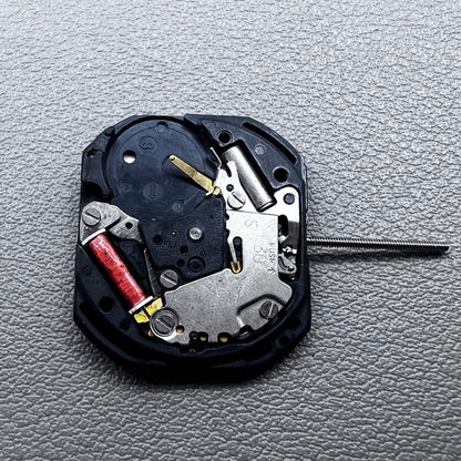Japan VX22 quartz watch movement with date at 3 o'clock, white disk replacement for precision.
