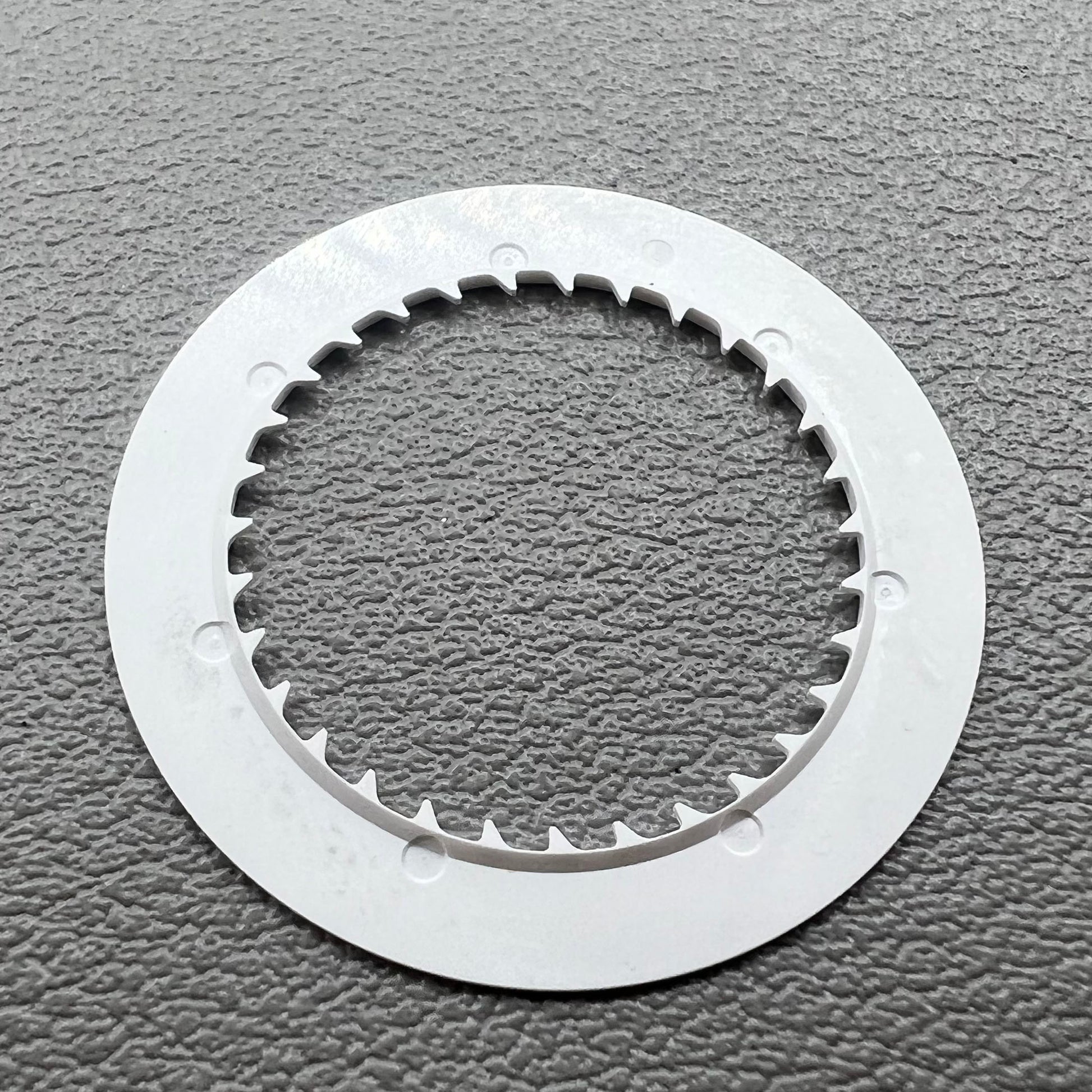 Blue date disk wheel for NH35 watch movement on white background, precise accessory.