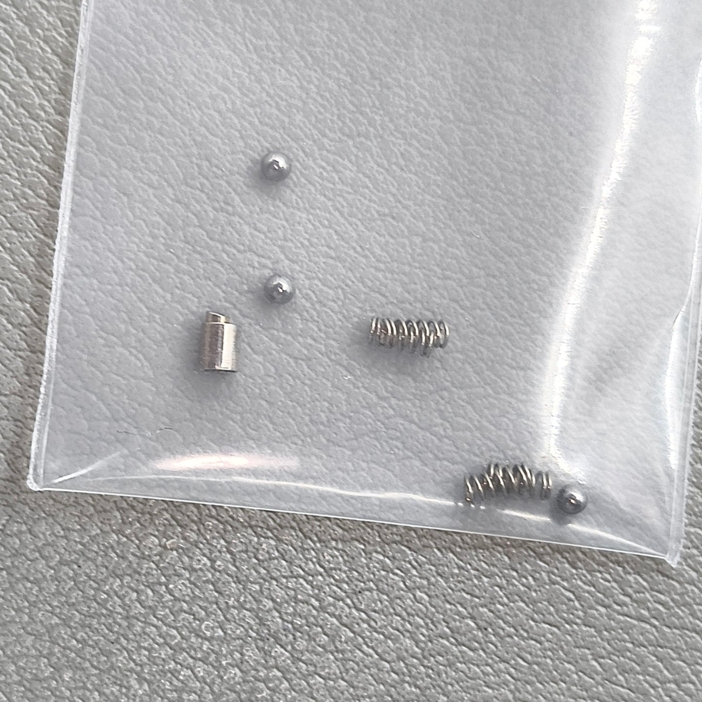 A Set of Watch Bezel Inner Case Spring Rotating Steel Ball Spring Ball for RLX SUB