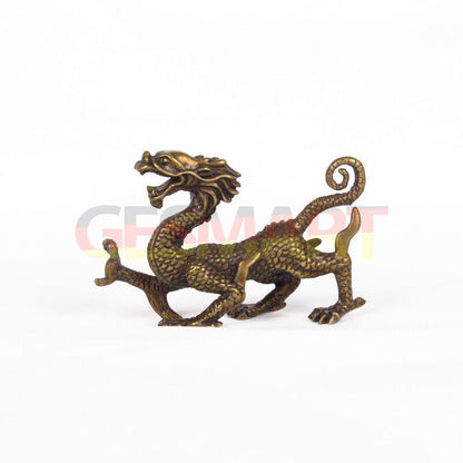 Hand-carved solid copper dragon figurine with detailed scales and polished finish.