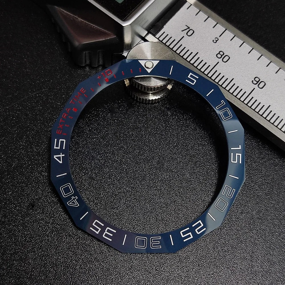 Sloping luminous ceramic bezel insert 42.3x33.3mm for automatic watch replacement, precise fit and durability.