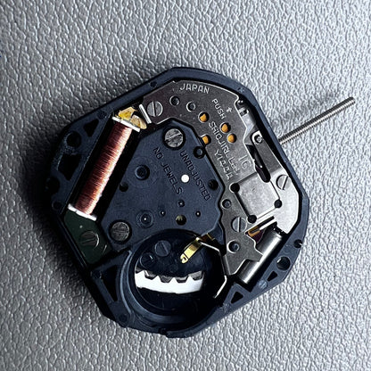 Japan Yl44A quartz watch movement with 3 hands, double calendar, and golden disk detail.