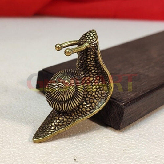 Hand-carved solid copper snail figurine, bronze finish, detailed collectible trinket.