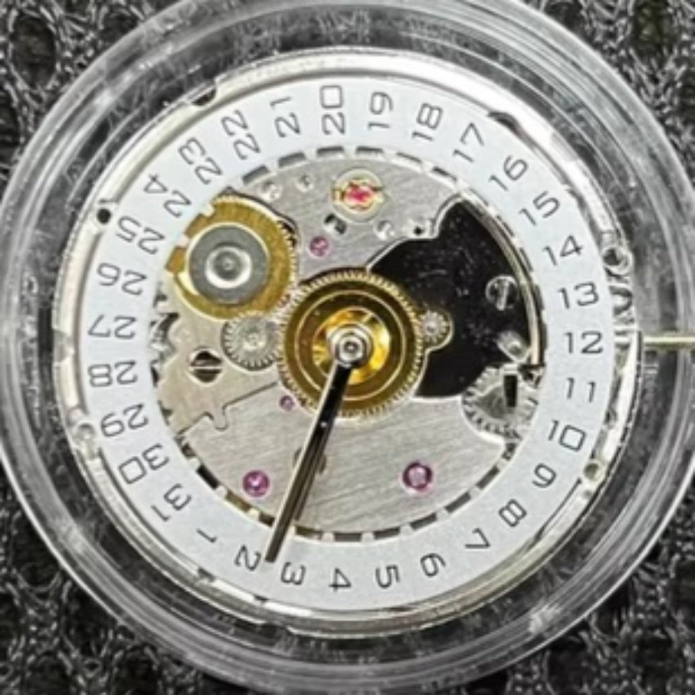 Close-up of Asian 7750 automatic chronograph movement with day date display at 3 o'clock for precise timekeeping.