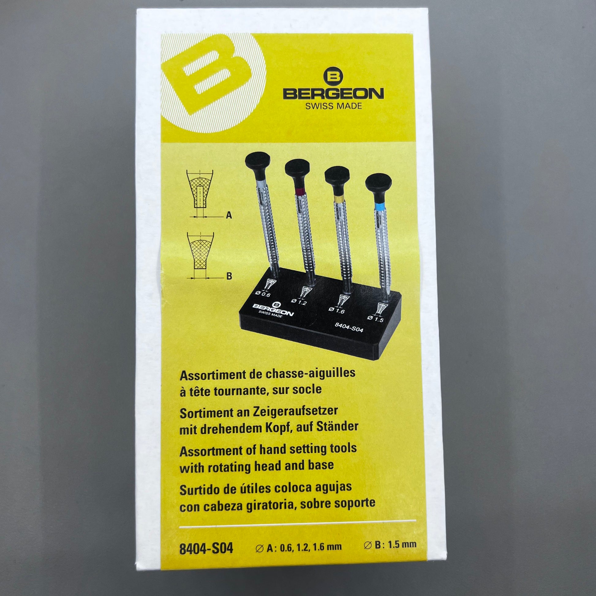 Swiss Bergeon 8404 watch hand fitting tools set of 4 on stand for precise watch repair accessories.