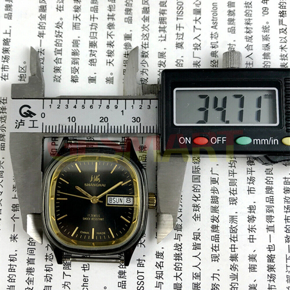 Shanghai Factory 33mm manual mechanical watch with black dial and double calendar, classic style for elegant occasions.