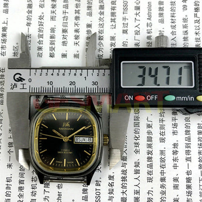 Shanghai Factory 33mm manual mechanical watch with black dial and double calendar, classic style for elegant occasions.