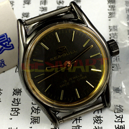 Elegant 27mm Tianjin Seagull ladies watch with golden round case and black dial, manual mechanical movement.