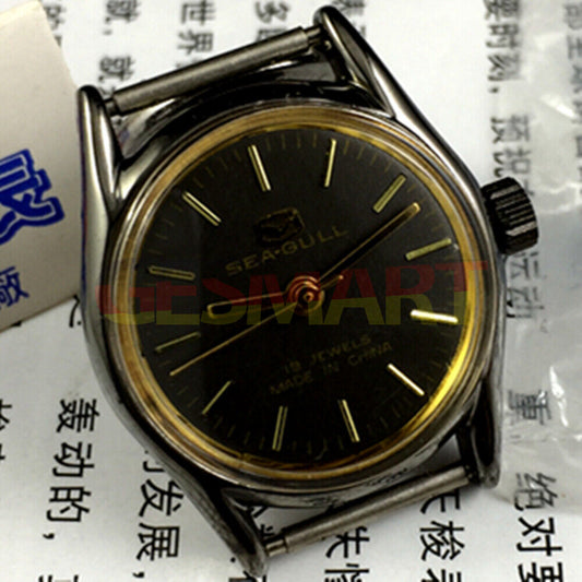 Elegant 27mm Tianjin Seagull ladies watch with golden round case and black dial, manual mechanical movement.