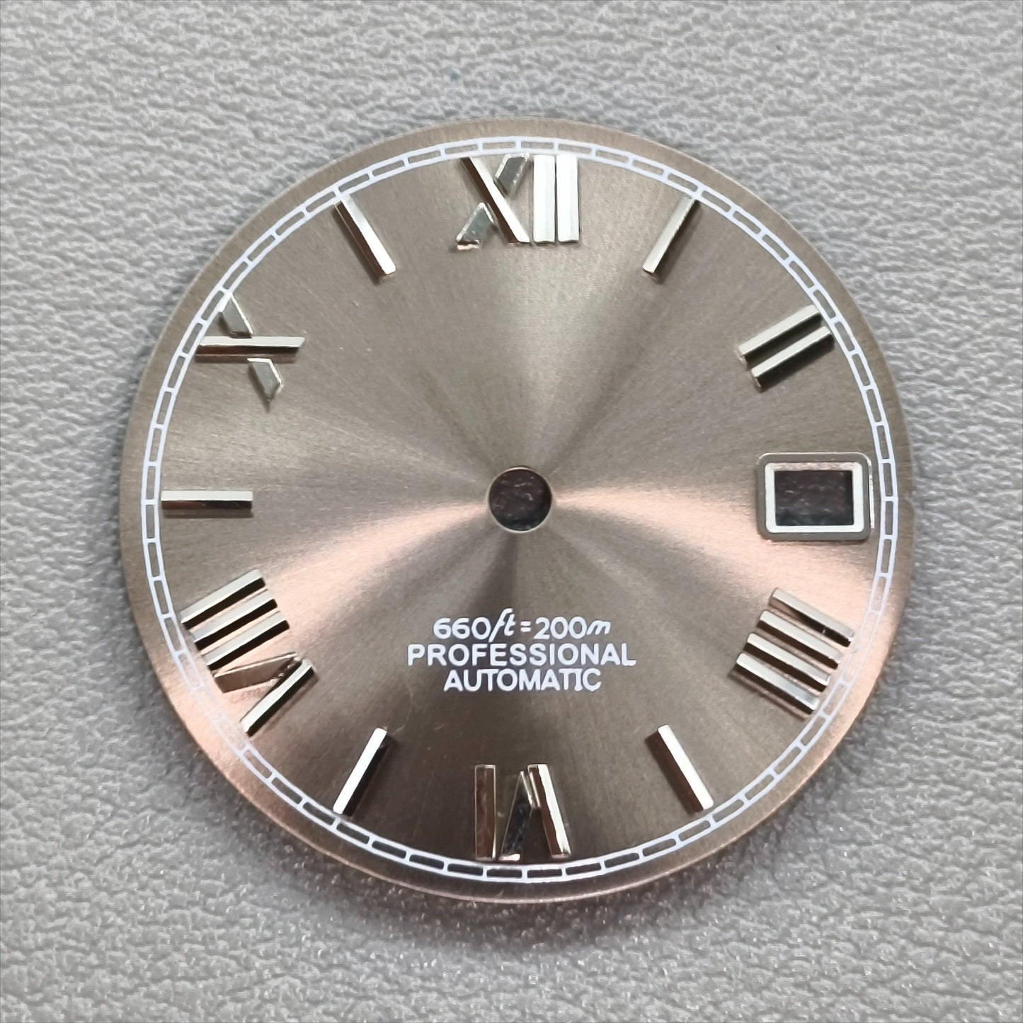 watch dial with S logo