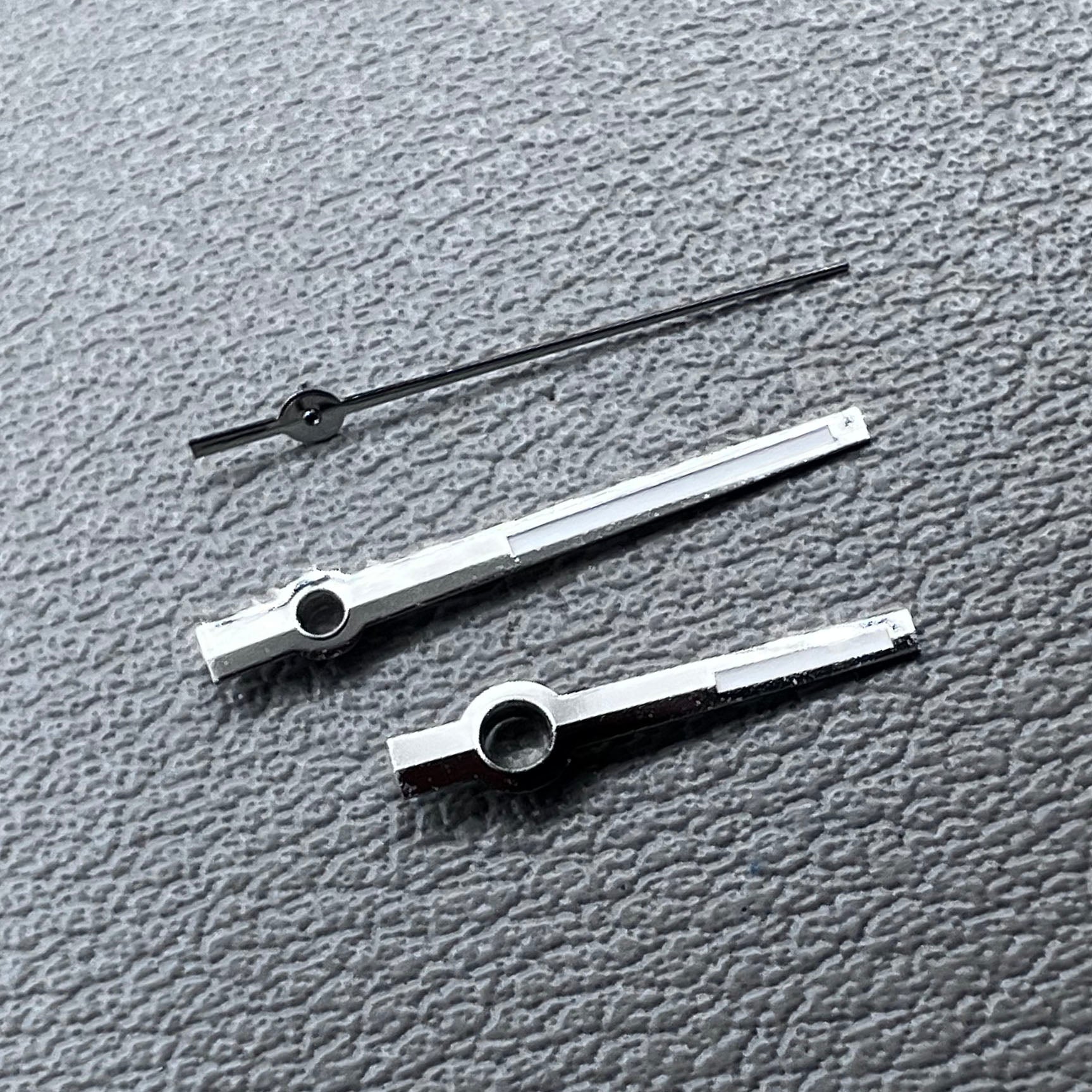 Green lume silver trim watch hands designed for Miyota 8285 movement, fits 31mm watch dial.