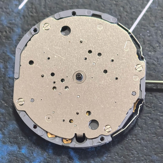 Japan Made Miyota JS10 quartz watch movement displaying small seconds at 6/9/12, precise watch accessory.