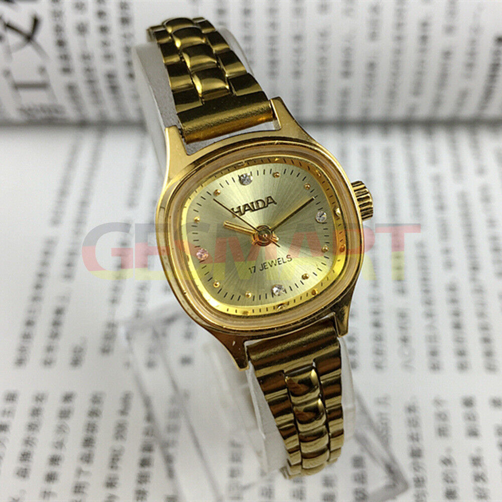 24mm SHANGHAI HAIDA lady watch with champagne dial, golden nails, and manual mechanical movement.
