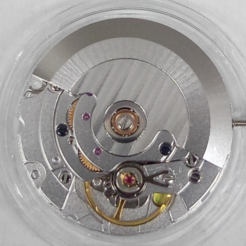 Silver Dandong 2824 mechanical watch movement, China-made replacement for ETA 2824-2 models.