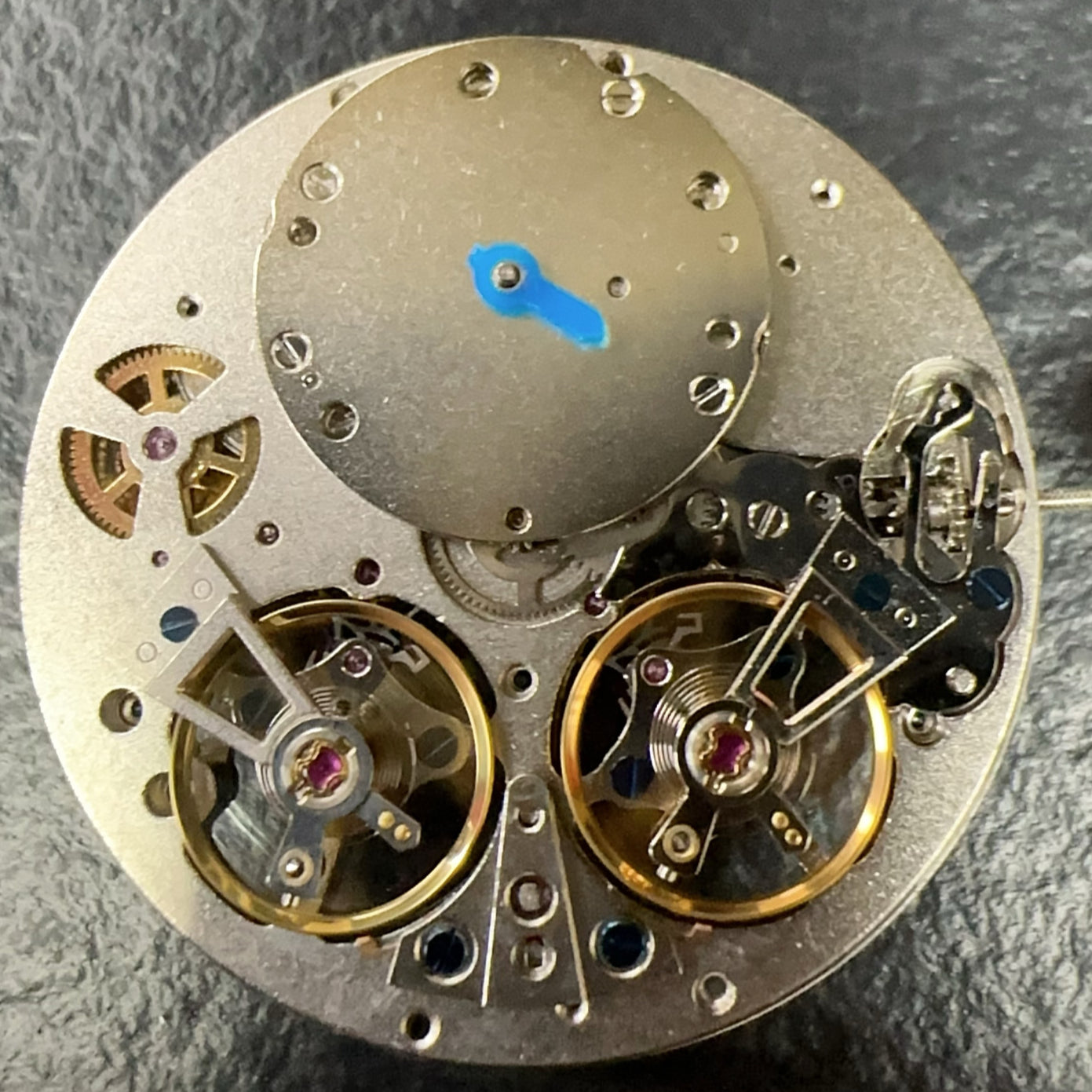 Chinese JH4033 Shanghai watch accessory showing multifunctional mechanical movement with hollow double balance wheel design