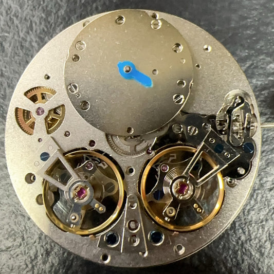 Chinese JH4033 Shanghai watch accessory showing multifunctional mechanical movement with hollow double balance wheel design