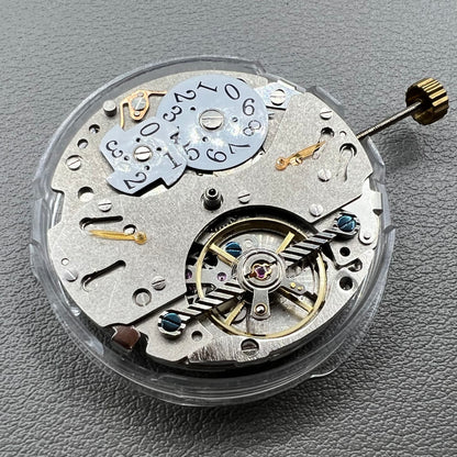 Wenzhou Mechanical watch movement with bare balance wheel and big date display at 12 o'clock.