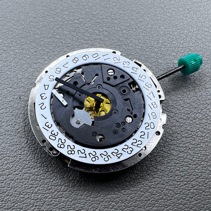 Swiss ISA 8172 silver plated quartz watch movement with stem, precise timekeeping for watch repair and assembly.