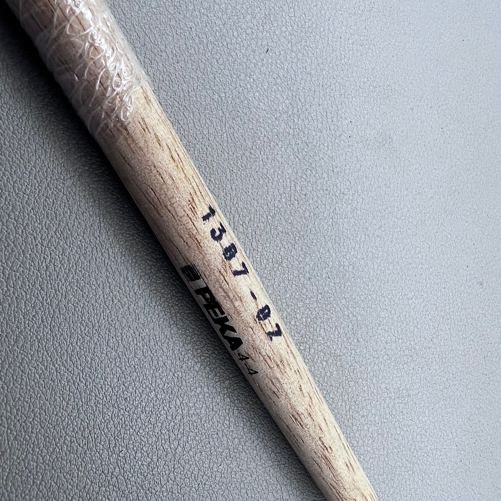 Swiss Bergeon 1307-02 white bristle brush for delicate watch cleaning and maintenance.