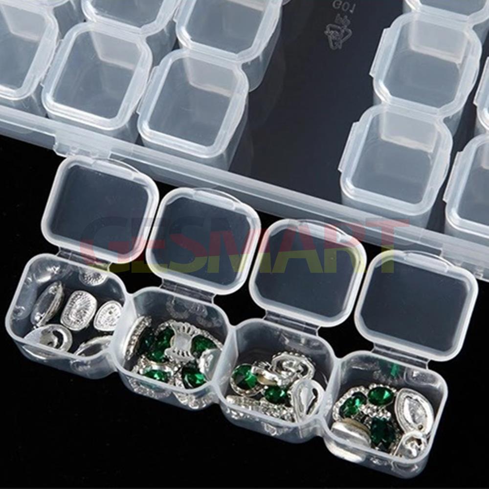 Clear 28-grid mini parts toolbox (11x17cm) with hinged lid for organized storage - durable and portable.