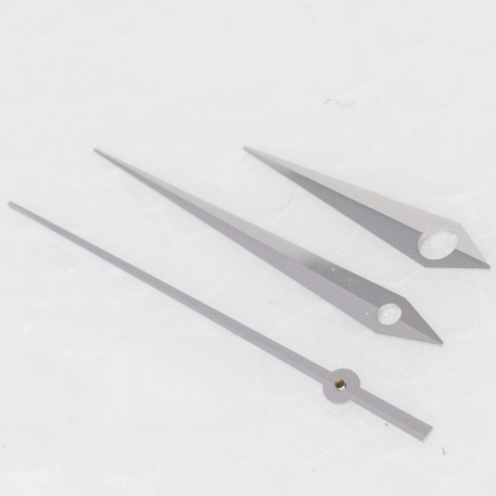 Silver arrow-shaped no-lume watch hands for ETA2824 movement, precise fit for watch repair and customization.