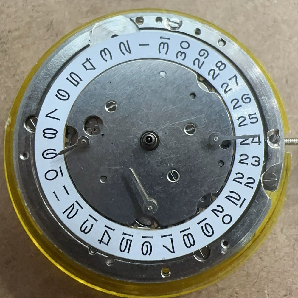 China Made ST10 2393 mechanical watch movement with small seconds and date at 3, 6, 9 positions.
