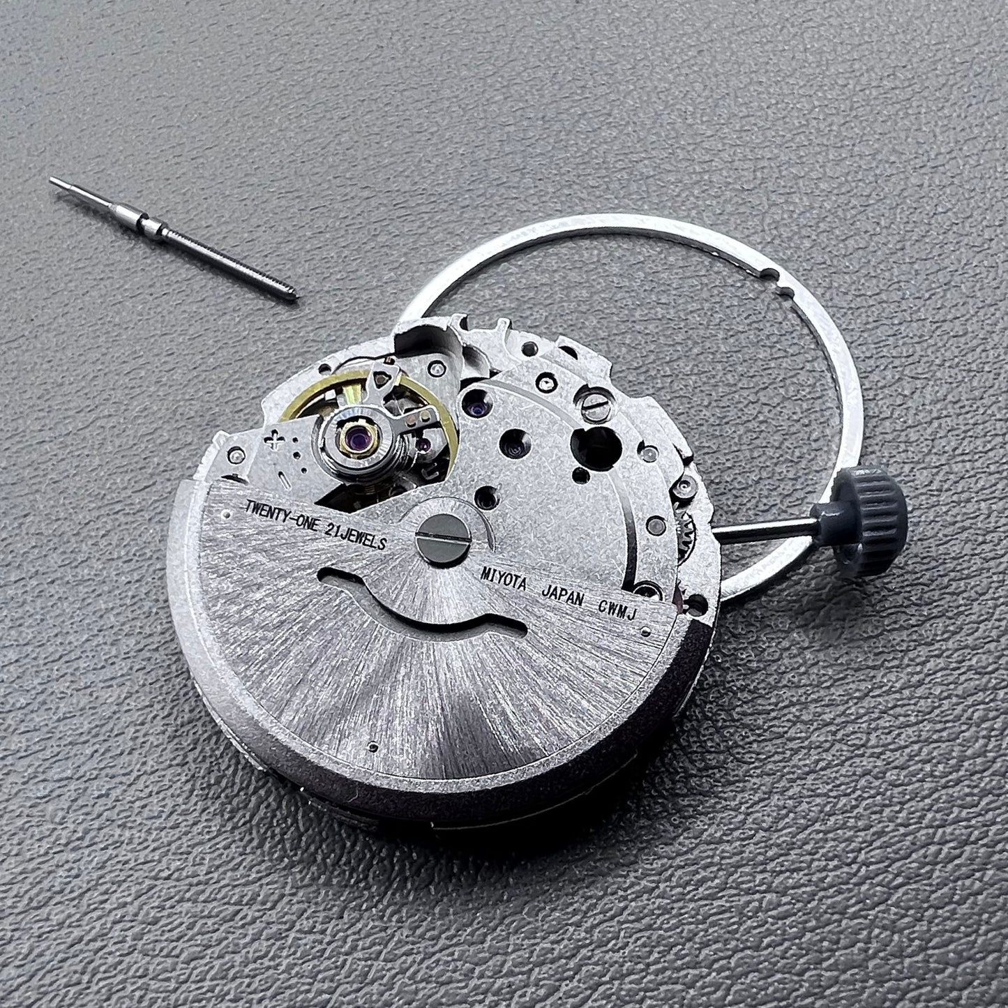 Japan Miyota 8215 silver plated automatic watch movement with date at 6 o?clock, precise mechanical design.